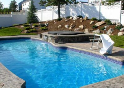 Rectangular pool with curved edges made of fiberglass